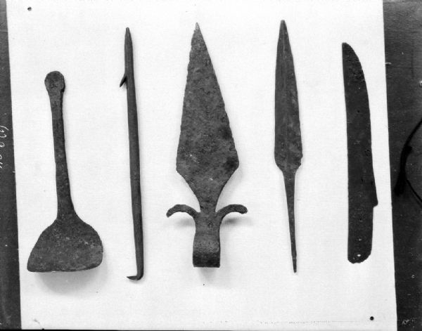 Prehistoric Wisconsin Native American implements and weapons, from the Wisconsin State Historical Society collection.