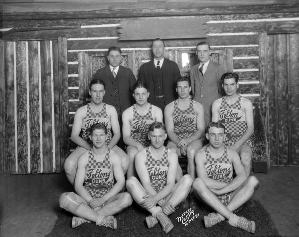 Felton's gun store basketball team, with three coaches.