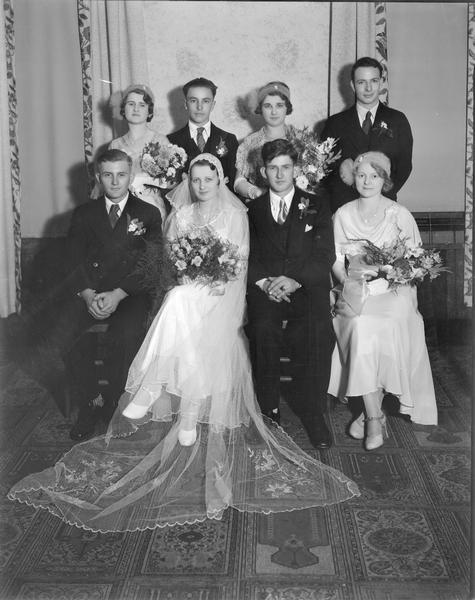 Formal portrait of the Clara Olive Gunderson and Carmen Spencer Hellickson wedding party.