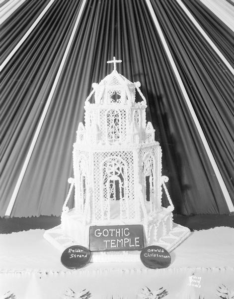 Gothic Temple Cake created by Reidar Strand and Oswald Christensen at Strand's Bakery's booth at the East Side Business Men's Association (ESBMA) Fall Festival.
