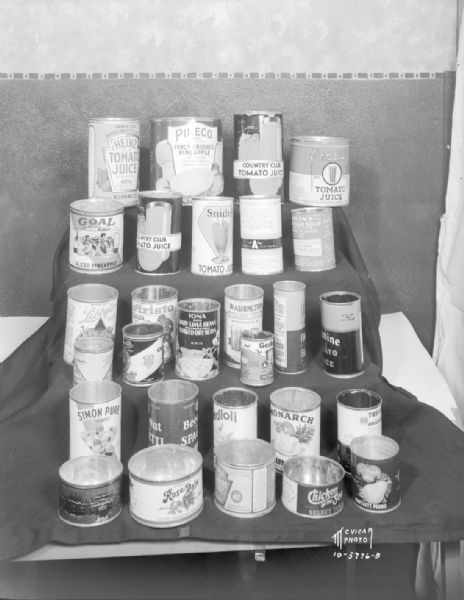 Display of Cans Display of food product cans in various sizes taken for the Department of Weights and Measures, State of Wisconsin.