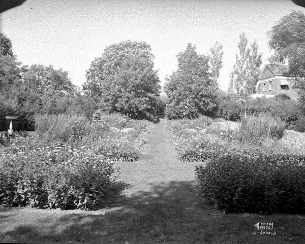 Dr. Frederick A. and Edith Davis's flower garden, 6048 S. Highlands Avenue, called Edenfred, from the east end.