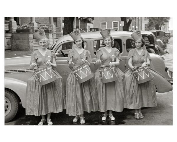 Beechnut Gum girls, posed in front of an automobile, promoting the product for a national advertising campaign.