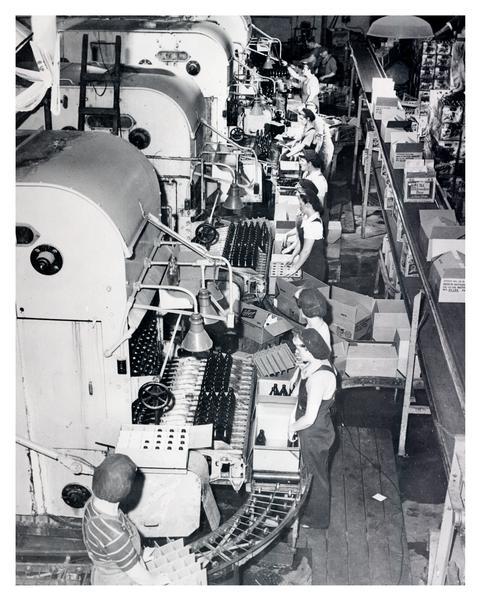 Workers at Schlitz Brewery Workers on the bottling line at the Schlitz Brewery.