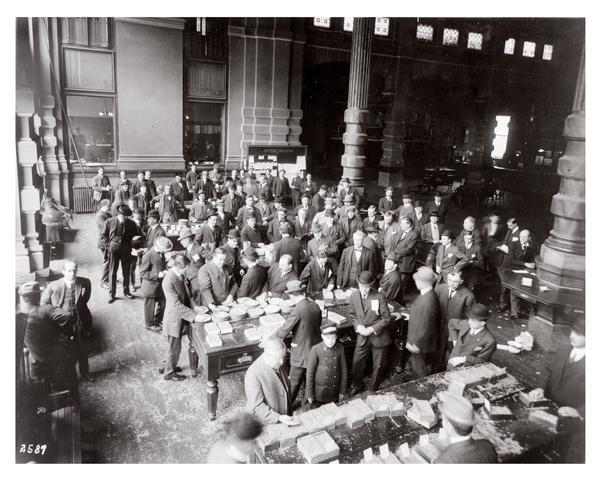 Sample tables in the Grain Exchange Room of the Chamber of Commerce Building. The Milwaukee Grain Exchange was a pioneer in grain trading with their development of the trading floor pit. They were also a forerunner in the sale of grain futures.