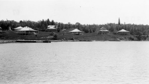 View from water of Mission cottages along shoreline of Lake Superior in La Pointe, Madeline Island.