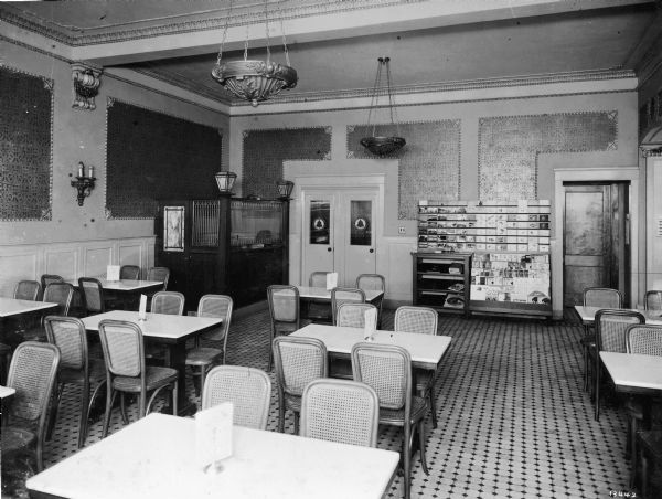 Interior view of the modern grill room and postal station in the Baldauf Drug Company.