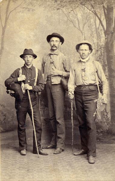 Studio portrait of famed University of Wisconsin pharmacist, Edward Kremers, and several U.W. college friends on an outing to the Wisconsin Dells. Left to right: Fred Beglinger, Joseph Powers, and Edward Kremers.