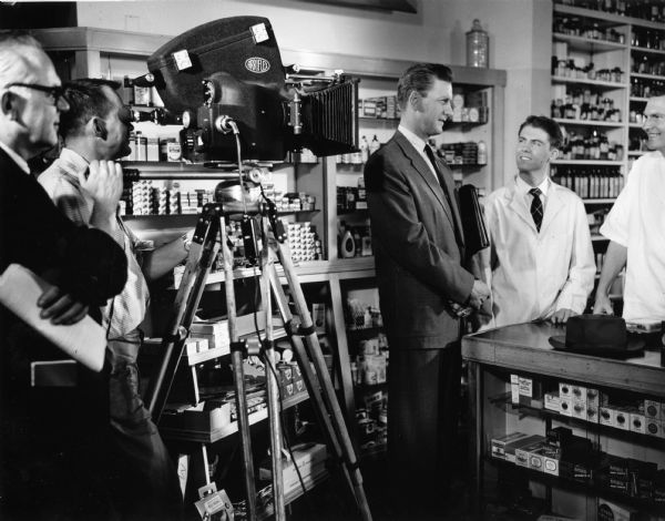 The camera moves in on a retail pharmacy scene in "Design for Life", a film produced by the American Association of Colleges of Pharmacy and the American Foundation for Pharmaceutical Education. The film is designed to interest promising students in a pharmaceutical career.