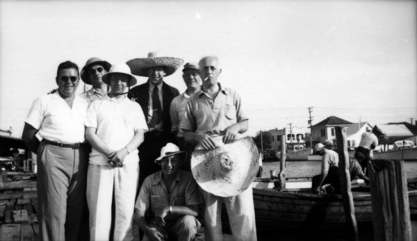 Pharmacist Robert Fischelis (front and center) wears a sombrero and poses with colleagues at an annual American Pharmaceutical Association convention.