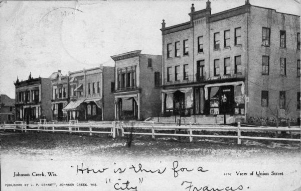 View of the businesses on Union Street, notably J.P. Dennett's Drug Store, located on the far right corner.