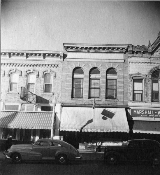 Exterior view from street of O.N. Falk's Drug Store, on Main Street.