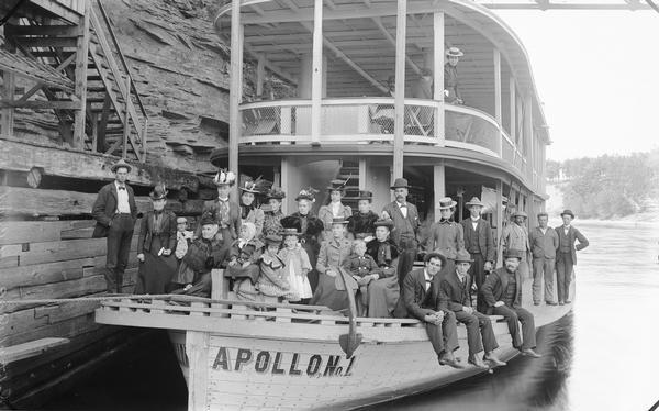 Passengers posing on bow of "Apollo No. 1" steamboat.