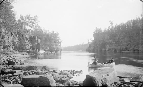 Jaws from Stone Pile. Two men are in a canoe.