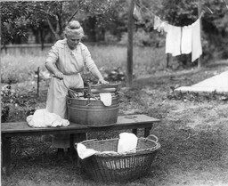 Woman with Wringer Washtub and Basket