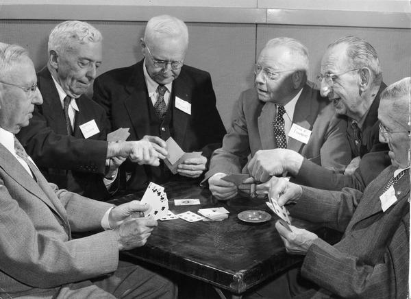 Members of a musician's union playing cards together.