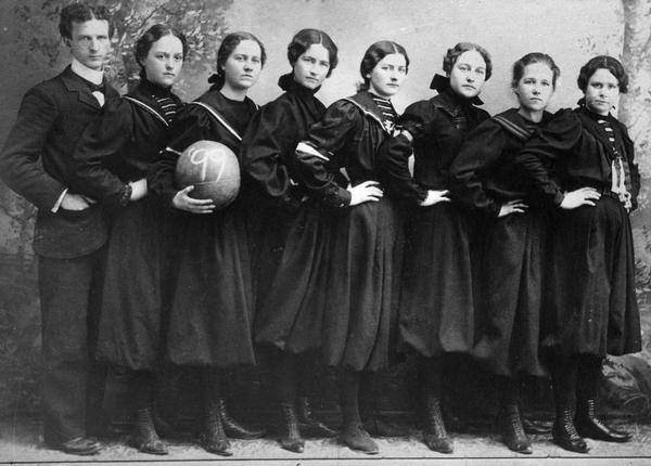 Women's basketball team poses for a group portrait.