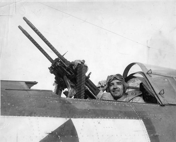 Marine Captain Joseph R. McCarthy, later a Wisconsin senator, posing as a tail gunner during World War II in Douglas SBD Bomber. McCarthy was an intelligence officer and he flew along as an observer on several bombing missions. McCarthy spent 16 months in the Solomon Islands, serving two tours from September 1943 to March 1944. He returned to the United States in July 1944, assigned to various California military bases. McCarthy resigned from the Marines on December 11, 1944. 
