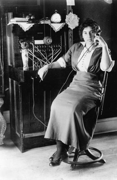 Josie Jepson (or Jepsen) at the telephone switchboard on Washington Island.