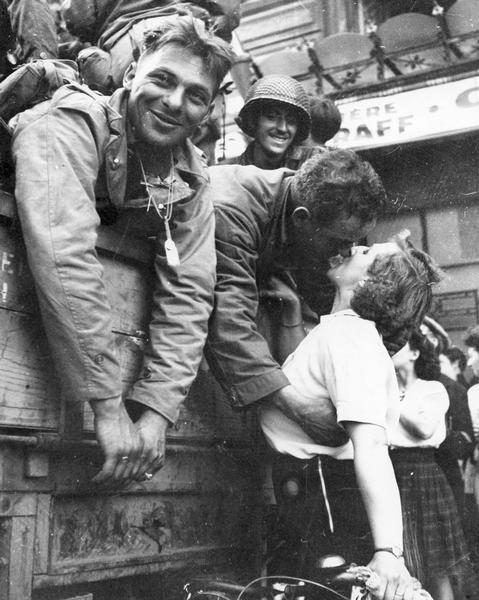 An American soldier receives a kiss in gratitude for the liberation of Paris during World War II.