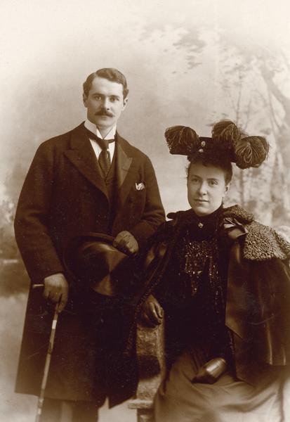 Studio portrait in front of a painted backdrop of Harold Fowler McCormick with his first wife Edith Rockefeller McCormick.