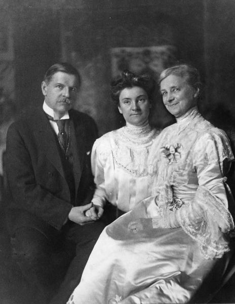 Portrait of Cyrus Hall McCormick, Jr., (1859-1936), Anita McCormick Blaine (1866-1954) and their mother, Nettie Fowler McCormick (1835-1923. The photo may have been taken on the occasion of Nettie's 70th birthday. During this period Cyrus, Jr. was President of the International Harvester Company; Anita was deeply involved in education and social work in the city of Chicago; and Nettie was contributing heavily to schools, colleges, and mission work in the United States and abroad.