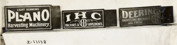 International Harvester Advertising Signs Series of three International Harvester advertising signs: Light Running Plano Harvesting Machinery; IHC Machines & Implements; Deering Harvester Machines and Twine.