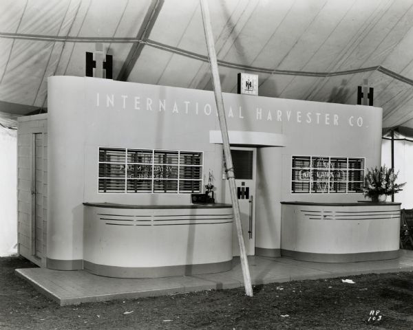 Exterior view of the International Harvester Company information booth and office at the Iowa State Fair.