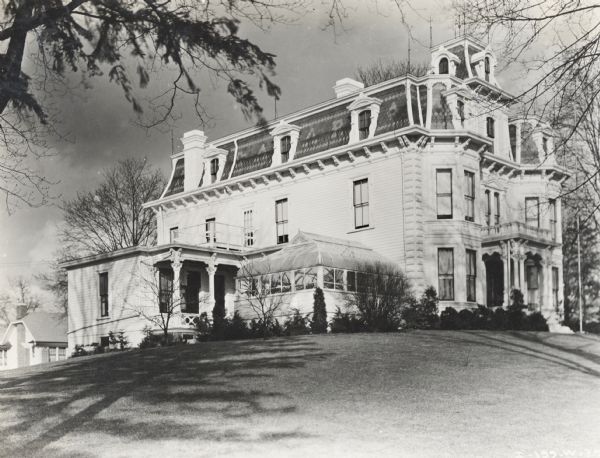 Mansion of Abram and Agnes Gaar, built in 1876. Gaar was one of the founders of the Gaar-Scott Company, manufacturers of steam engines and threshing machines. At the time of the photograph the house was occupied by Joseph H. Hill and Lucille Gaar Hill.