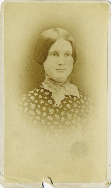 Portrait of Nettie Fowler McCormick as a young woman, wearing a lace collar.