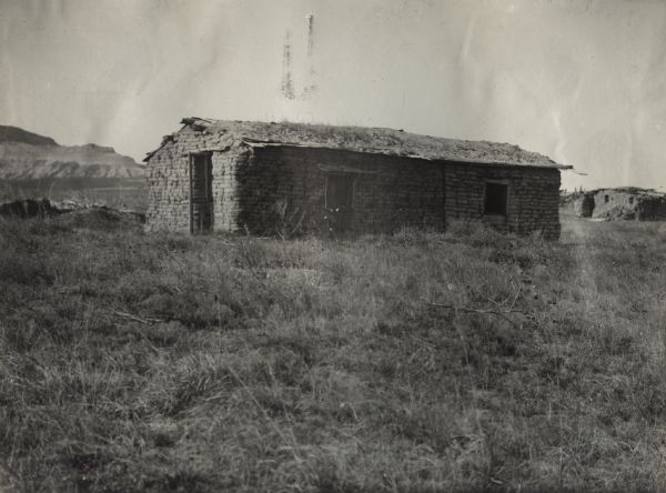 Original caption reads: "Union Pacific Special Trip: Oldest sod house in Platte Valley, 1886, H.W. Roberts."