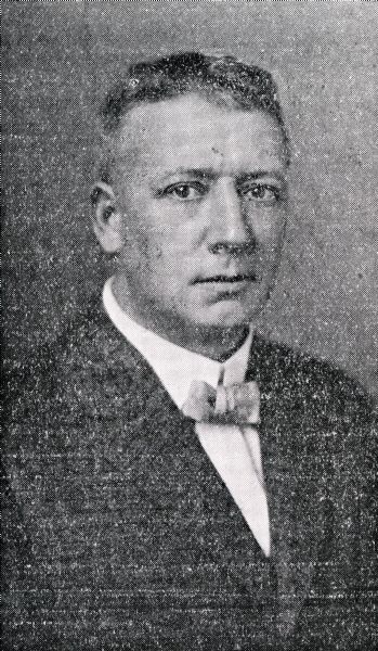 Quarter-length portrait of William M. Reay, who acted as Comptroller of the International Harvester Company starting in 1907.