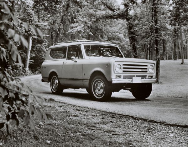 1972 International Scout II 1972 model International Scout II. Original caption reads "(Photo # W-6893) The 1972 model International Scout II vehicle. A completely new second-generation design in its field, the 100" wheelbase Scout II offers such options as V-8 engines, automatic transmission, power brakes and steering and air conditioning. New for '72 are a larger optional six cylinder engine, an optional 3200 lb. driving front axle for All-Wheel Drive models, and a new 3-speed automatic transmission rated to handle any engine. Mt-3555 (1) 9/15/71/."
