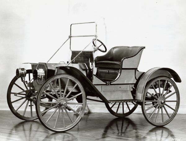 International Convertable Coupe (Roadster) Three-quarter view from front of driver's side. Original caption reads "International Convertable Coupe (Roadster) 1910 4 cylinder aircooled engine. Made by the International Harvester Co., Chicago, Ill. no. 405 Model-G rear Wheels- 41" overall Front Wheels- 41" overall."