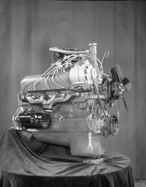 Scout Engine Scout engine displayed on a table draped with fabric.