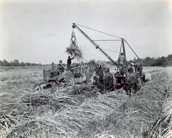 The caption states: "Farmall MV shown is owned by C.R. Tschirn of Donaldsville, Louisiana, who operates a 350-acre farm, 225 acres of which were in sugar cane."