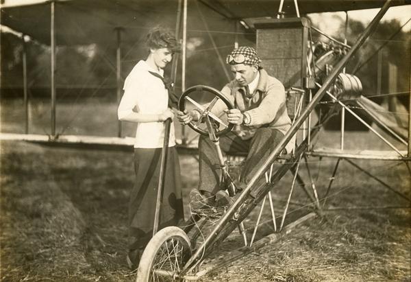 John Kaminski, his Curtiss pusher, and a young admirer.