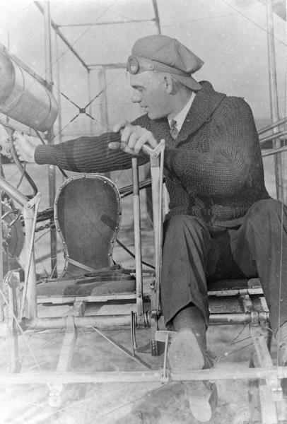 Jesse C. Brabazon of Delavan, Wisconsin in a 1911 Wright Model B, the first Wright plane designed to carry a passenger and a pilot. Previously, the passenger sat on the wing and held on tight. This plane also has dual controls which were necessary on airplanes used for instruction. It is likely, then, that this picture was taken about the time Brabazon earned his pilot's license.