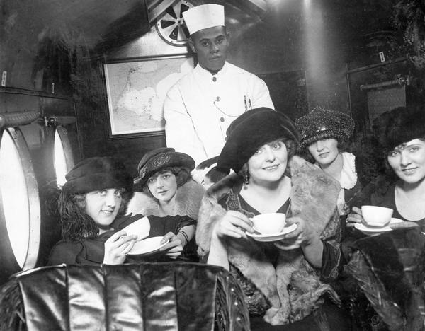 A tea party on an airplane, a publicity stunt conceived by Harry Bruno to promote his Cleveland-area airline, Aeromarine Airlines. By taking local reporters and photographers along on an aerial tea party he hoped to demonstrate that flying was safe and comfortable. Eventually Bruno left the airline business and turned to public relations where he made a specialty from his aviation background. Bruno's papers are among the many public relations collections available at the Wisconsin Historical Society Archives.