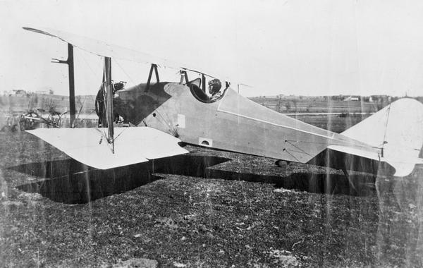 The bi-plane constructed by Melvin Thompson during the years 1918-1920 on his farm near the former quarry in Lamont Township.