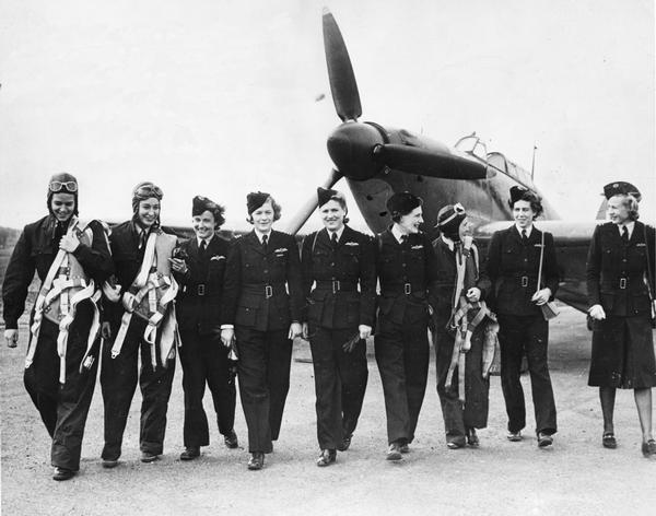 Jacqueline Cochrane (directly under the propeller) with a group of women pilots in the British Air Transport Auxiliary. One of the leading race and test pilots of her era, Jacqueline Cochrane played an important role in organizing the U.S. Women's Air Service Pilots (WASPs) after she saw the valuable work of the civilian ATA in ferrying aircraft around England.
