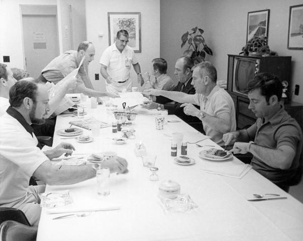 The Apollo 16 flight crew and backup crew at the breakfast served four hours before launch. With them, seated on the right side of the table and pointing, is Donald K. Slayton of Sparta, Wisconsin, the chief of the flight crew operations. Left to right around the table are: Edgar D. Mitchell, lunar module pilot Charles M Duke, Stuart Roosa, command module pilot Thomas Mattingly (partially shown), David Pallard, Charles Buckley, Slayton, and mission commander John Young.  Slayton was selected as one of the original Mercury 7 astronauts, but he was grounded because of an irregular heart beat. Slayton then became director of flight crew operations. In 1972 a healthy Slayton was restored to flight status, and in 1975 he flew on the nine-day Apollo-Soyuz mission. This photograph is part of the NASA press material collected by ABC science reporter Jules Bergman. His papers are available for research at the Wisconsin Historical Society Archives.