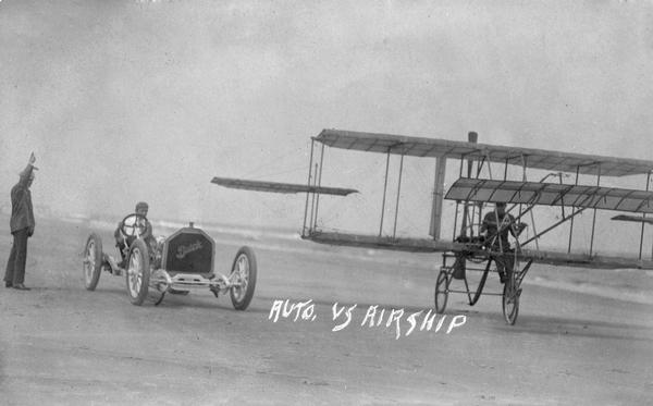 Carl S. Bates, a young inventor from Clear Lake, Iowa, about to race the Buick owned by Louis Strang on the beach at Daytona Beach.  Bates originally challenged Curtiss and the Wright Brothers to an airplane race in Florida. When that failed, he settled for an automobile race.  The automobile won. Automobile-airplane races soon became standard fare at pre-World War I air shows.