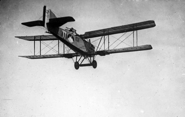 A view from below of a Breguet 14, a French observation plane that could also be used as a light bomber. When functioning as a bomber, the pilot was the bombardier and the co-pilot manned the machine guns on the rear cockpit.
