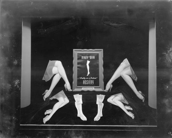 Advertisement in picture frame for Beauty Wear "Pretty as a Picture" hosiery.
