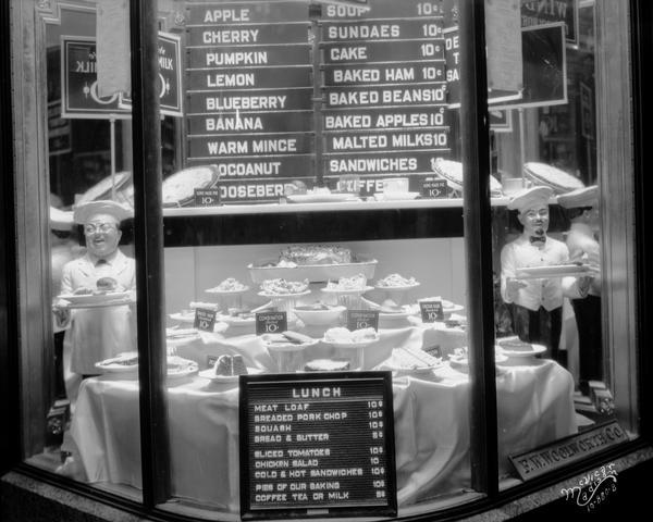 F.W. Woolworth Company, 1-5 East Main Street, window display of restaurant menu and an array of desserts.