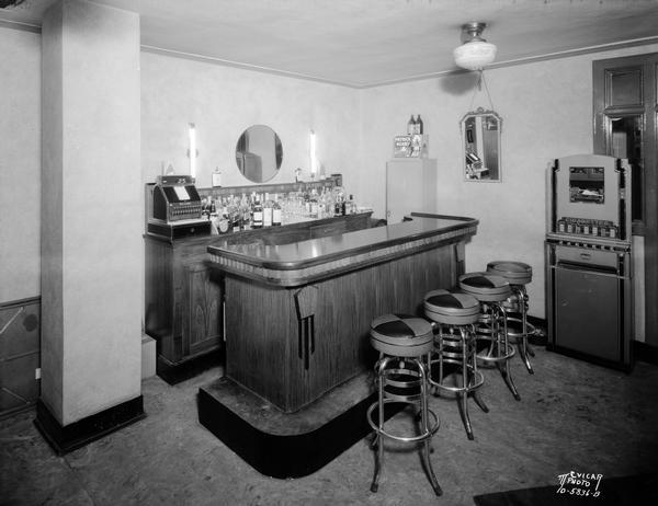 Kennedy Manor dining room bar with four stools and cigarette vending machine, 1 Langdon Street.