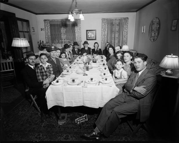 Abe and Sarah Mintz's family gathered around the dining room table for Passover supper, 336 West Wilson Street.