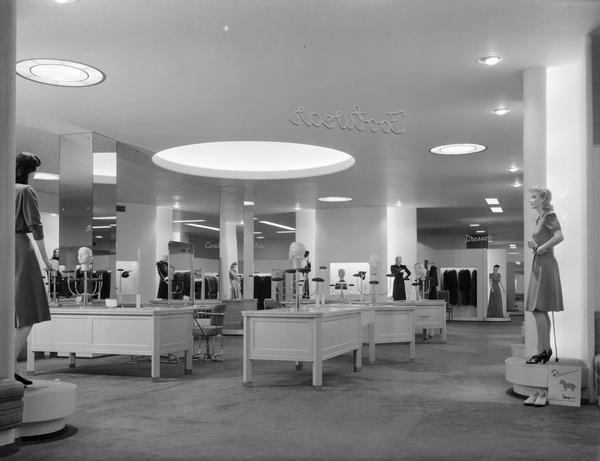 Interior view of Manchester's Department Store, 2-6 East Mifflin Street, second floor remodeling, looking from Footwear Department, past hats to Coats & Furs and Dress Departments.