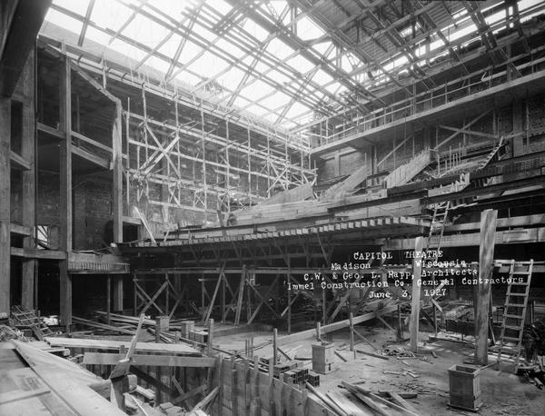 An interior view of the Capitol Theatre auditorium and balcony under construction.